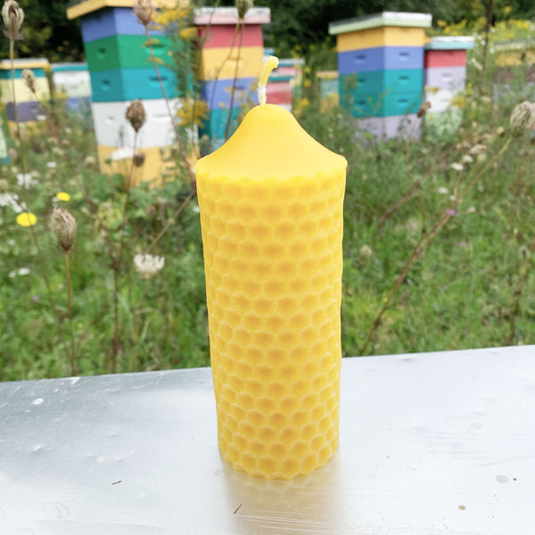 Tall circular beeswax candle